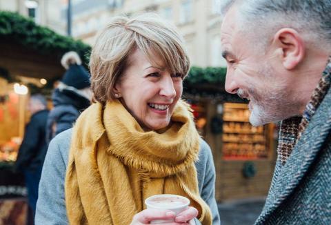Smiling senior man and woman out and about in the winter